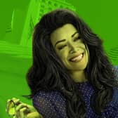 Tatiana Maslany as She-Hulk. She has green skin and big hair; the background behind her has a lime green wash over it (Credit: Marvel/Disney+)