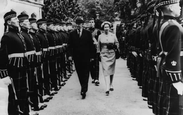 President Eisenhower and HM Queen Elizabeth II inspecting a Guard of Honor at the gates of Balmoral, Scotland, August 28th 1959. (Photo by Keystone/Hulton Archive/Getty Images)