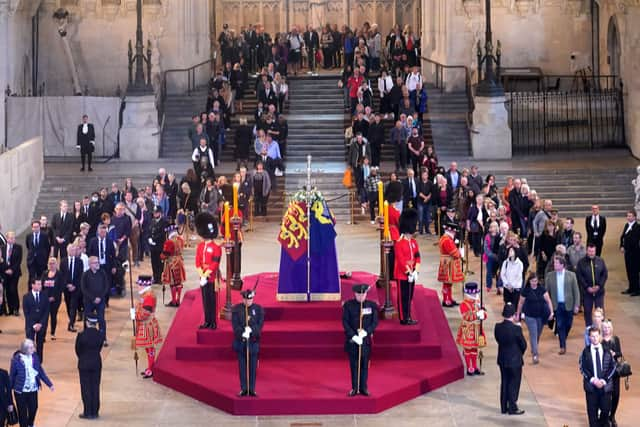 Members of the public file past the Queen’s coffin in Westminster Hall. Credit: Yui Mok - WPA Pool/Getty Images