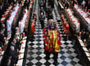 Soldiers of The Queen’s Company of the Grenadier Guards carry the coffin of Queen Elizabeth II