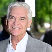 Phillip Schofield’s We Buy Any Car images are replaced online after allegation of jumping the queue, at Westminster Hall. (Photo by Gareth Cattermole/Getty Images)