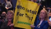 Protestors heckle Prime Minister Liz Truss during her keynote speech at the Conservative Party Conference 2022 in Birmingham.