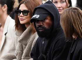 Kanye West attends the Givenchy Spring-Summer 2023 fashion show during the Paris Womenswear Fashion Week, in Paris, on 2 October 2022 (Photo: JULIEN DE ROSA/AFP via Getty Images)