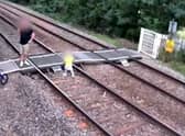 CCTV footage released by Network Rail capturing some of the reckless behaviour at a popular level crossing.  