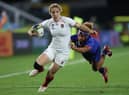 Abby Dow of England is tackled during the Pool C Rugby World Cup 2021 match between France and England 