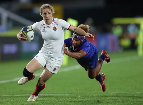 Abby Dow of England is tackled during the Pool C Rugby World Cup 2021 match between France and England 