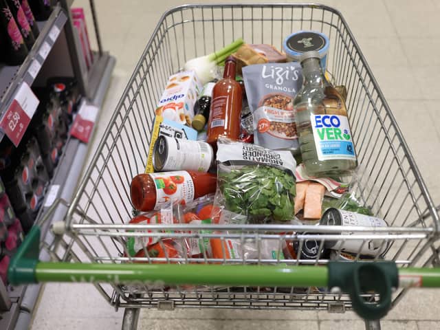 A shopping trolley is pictured at a Waitrose supermarket in London. 