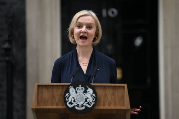 Britain’s Prime Minister Liz Truss delivers a speech outside of 10 Downing Street in central London on October 20, 2022 to announce her resignation.  (Photo by Daniel LEAL / AFP) (Photo by DANIEL LEAL/AFP via Getty Images)