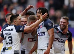England celebrate Dom Young’s try against Samoa during World Cup opener