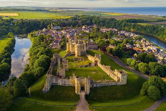 A view over Warkworth Castle and the surrounding village which has topped the list of British villages which have risen in value for 20 years straight.