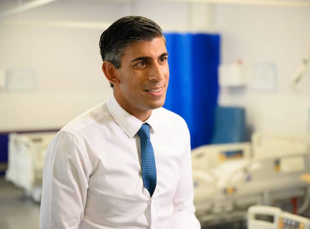 Prime Minister Rishi Sunak speaks with members of the media as he visits Croydon University hospital on October 28.