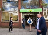 People walk near the Job Centre in Westminster.