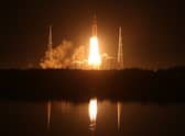 Artemis I Space Launch System (SLS) rocket, with the Orion capsule attached, launches at NASA's Kennedy Space Center on November 16