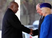 South Africa's President Cyril Ramaphosa is greeted by Britain's King Charles III and Britain's Camilla, Queen Consort 