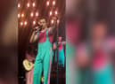 Video footage shows Harry Styles asking the crowd to move back slowly to stop fans being crushed against the handrails.