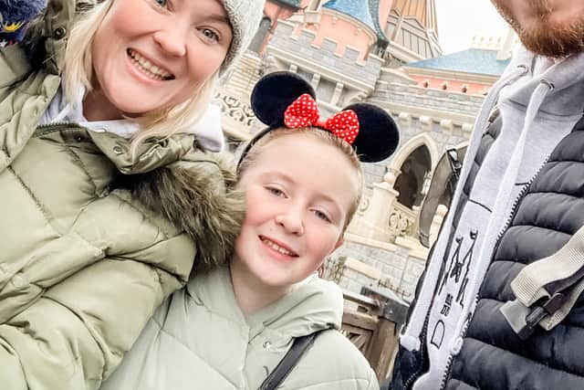 Natasha Burt, husband Daniel and children Lilly and Parker in Disneyland