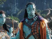 Ronal (Kate Winslet), Tonowari (Cliff Curtis), and the Metkayina Clan (Photo: © 2022 20th Century Studios)