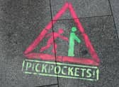 Major travel scams and how to avoid in 2023 including pickpockets, fake COVID tests, and unlicensed taxi firms
