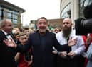 Michael Flatley, star of Riverdance and Lord of the Dance is mobbed by fans as he makes an appearance during the opening day of the World Irish Dancing Championships at the Waterfront Hall on April 10, 2022 in Belfast