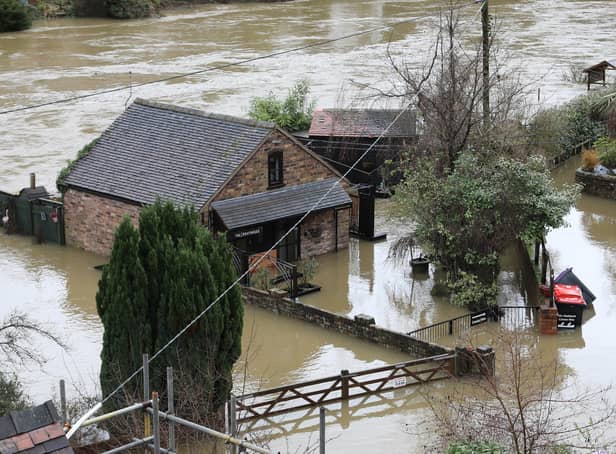 Houses in Ironbridge surrounded by flood waters as River Severn levels started to rise following heavy rain.