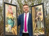 Charles Hanson, owner of Hansons Auctioners, with Queen Victoria’s paintings.  