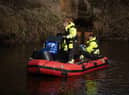 Specialists search the River Wyre this morning (February 6).