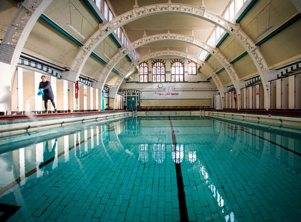 Stephanie Jones Duty Manager cleaning The Moseley Road Baths after renovation