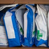   Pharmaceuticals and prescriptions awaiting collection are seen inside a independent chemist shop are seen on February 12, 2016 in Bath.