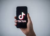 A letter from the Inter-Parliamentary Alliance on China (IPAC) to the information commissioner argues TikTok could be in breach of UK law. (Photo by LOIC VENANCE / AFP) (Photo by LOIC VENANCE/AFP via Getty Images) 