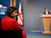Suella Braverman listens on as prime minister Rishi Sunak announces the Illegal Migration Bill