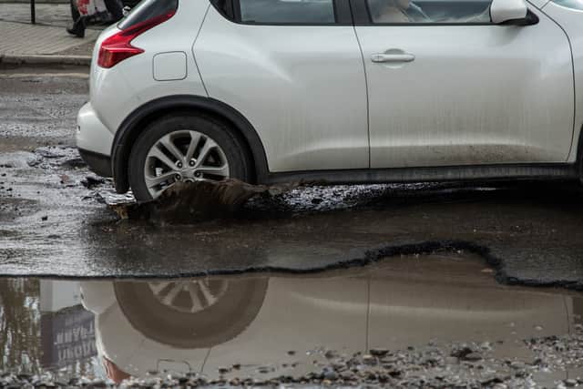 A report by Kwik-Fit estimates that potholes have caused £1.7bn of damage in the last year (Photo: Adobe Stock)