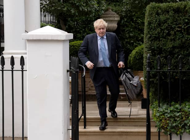 Former PM Boris Johnson leaving his home for the Commons Privileges Committee