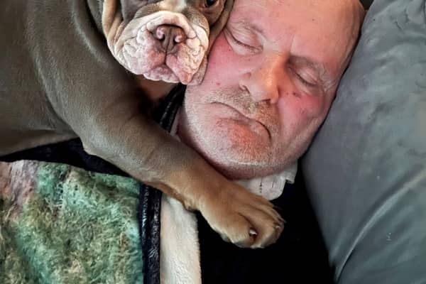 Ain’t nothing but a hound, Doc: David Lindsay with his British Bulldog puppy, Harley. 