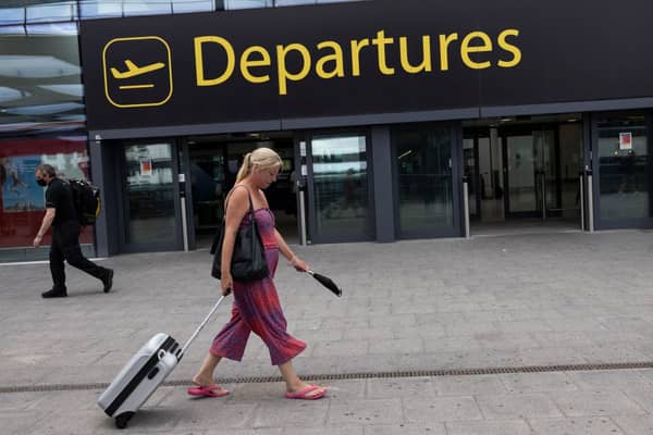 Travellers at Gatwick Airport on July 30, 2021 in London, England. (Photo by Dan Kitwood/Getty Images)