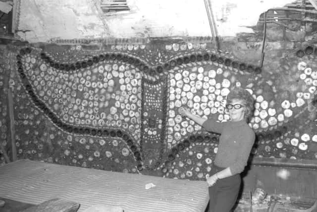 September, 1974 - A final attempt to save the Whale Inn, in Main Ridge, from demolition failed in this month. This picture of its shell decorations was in taken in 1971.