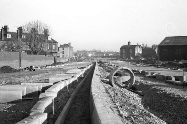 January, 1977 - Construction of John Adams Way, looking up towards Main Ridge from the area behind South Street.