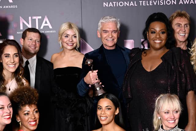 OCTOBER 13: The team from 'This Morning' including Holly Willoughby, Phillip Schofield and Rochelle Humes, with the Best Daytime award for 'This Morning', in the winners' room at the National Television Awards 2022 at OVO Arena Wembley on October 13, 2022 in London, England. (Photo by Gareth Cattermole/Getty Images)