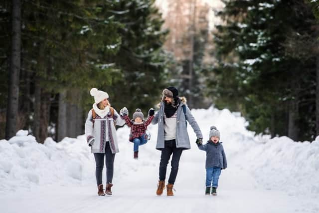 Bundle up and spend some time together in nature on a winter walk (photo: Shutterstock)