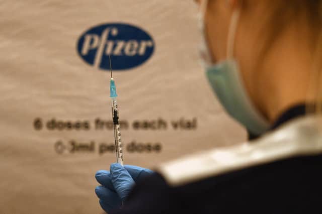Vaccines should work against Omicron variant, WHO says (Photo: OLI SCARFF/AFP via Getty Images)