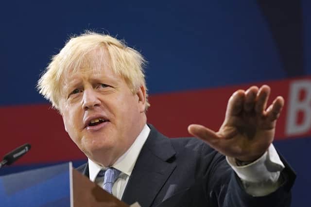 Boris Johnson delivers his leader's keynote speech during the Conservative Party conference at Manchester Central Convention Complex (Photo by Ian Forsyth/Getty Images)
