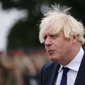 UK prime minister Boris Johnson meets with military personnel who worked on the Afghan evacuation during a visit to Merville Barracks on September 2