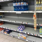 Photo taken with permission from the Twitter feed of @HapG86 of empty shelves in a Co-op (PA)