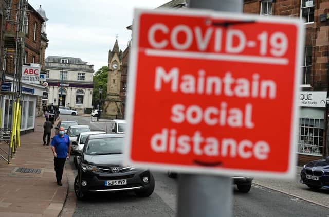 Mask wearing and social distancing measures will end as part of the lifting of lockdown restrictions in England on 19 July, reports have suggested (Photo: OLI SCARFF/AFP via Getty Images)