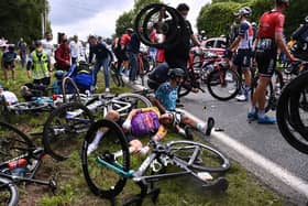 The entire pelaton came crashing down after a spectator reached out into the road with a placard (Photo: Getty Images)
