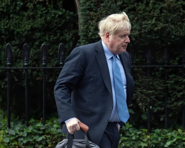 MPs have urged Boris Johnson to pay his own Partygate legal fees