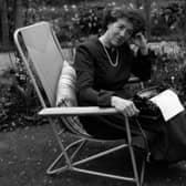 Children's writer Enid Blyton sitting in her garden in Beaconsfield, Buckinghamshire (Photo: George Konig/Getty Images)