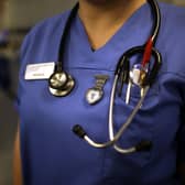 A report by the Health and Social Care Committee called for immediate action to support exhausted staff who have worked throughout the Covid-19 pandemic (Getty Images)