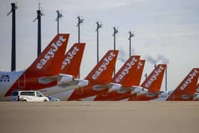 Easyjet planes are seen parked at the "Berlin Brandenburg Airport Willy Brandt" in Schoenefeld, southeast of Berlin (Photo by ODD ANDERSEN/AFP via Getty Images)
