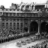 Queen Elizabeth II Coronation carriage and procession coming through Admiralty Arch on the way from Westminster Abbey to Buckingham Palace