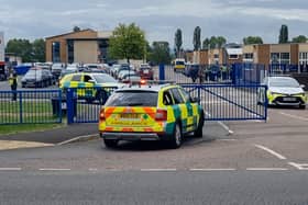 A teenage boy has been arrested after a teacher was stabbed at a secondary school in Tewkesbury, Gloucestershire 